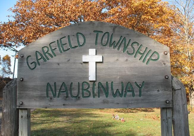 Garfield Township Naubinway welcome sign in autumn.